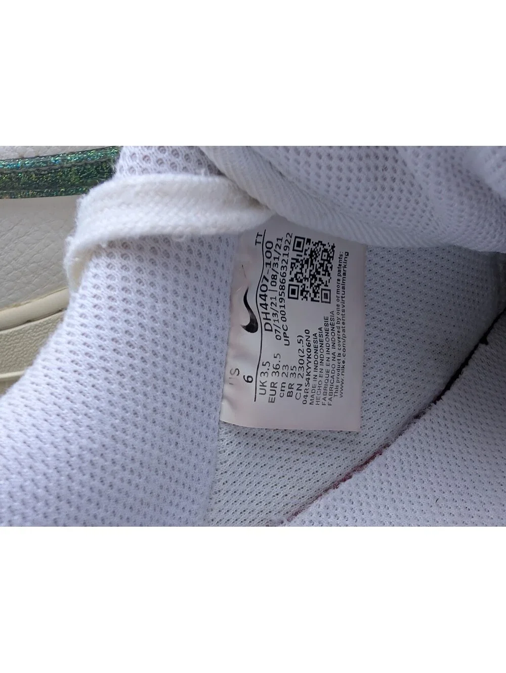 Nike Air Force 1 White Sneakers with Green Swoosh